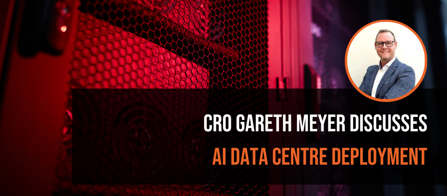 Red-lit data centre interior with text: "CRO Gareth Meyer discusses AI data centre deployment" and a circular photo of a man in glasses and suit.